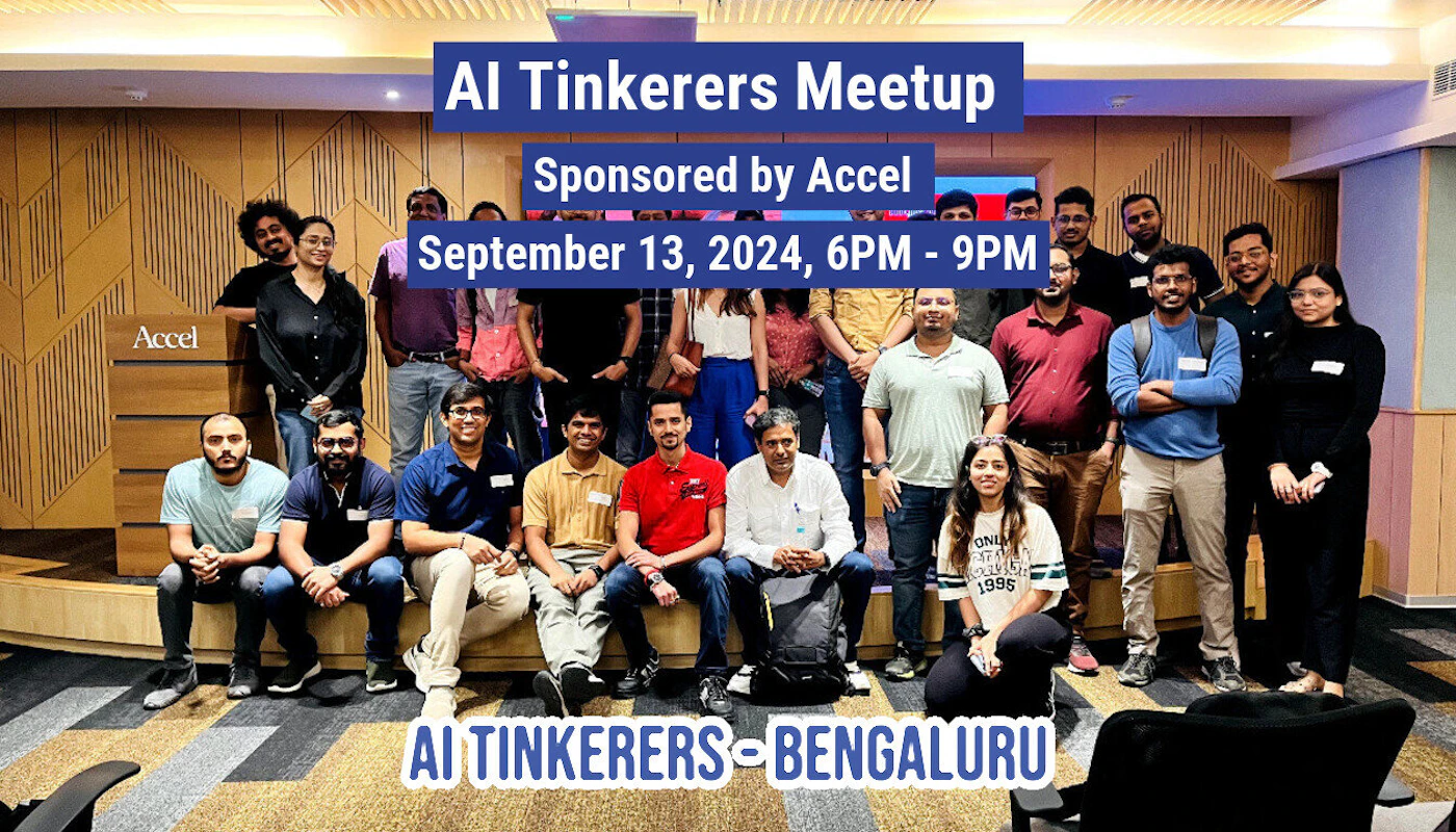 (Banner) A promotional banner featuring a group photograph of approximately 20 people attending the 'AI Tinkerers Meetup' sponsored by Accel, with event details overlaid on the image. Text: AI Tinkerers Meetup Sponsored by Accel September 13, 2024, 6PM - 9PM AI TINKERERS - BENGALURU Accel Promotional graphic overlaying a candid group photo. | Colors: #2A49A1, #FFFFFF, #8B694F Note: The image is a promotional graphic designed to advertise an event, utilizing a background photo overlaid with structured, high-contrast text boxes containing headlines and event details, fitting the definition of a banner.