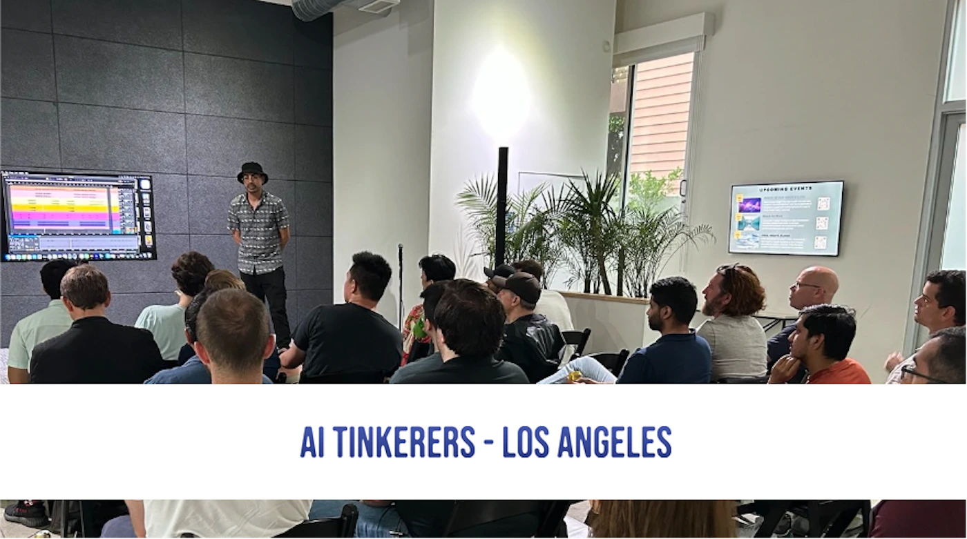 (Photo) A photo of a presentation being given to a group of people in a room.  A speaker stands in front of a screen displaying information, while the audience sits in chairs. Text: AI Tinkerers - Los Angeles UPCOMING EVENTS people | indoor | presentation, audience, speaker | candid Note: The image is a real-life captured scene of a presentation, making it a photograph. It's not a drawn or digitally created image.