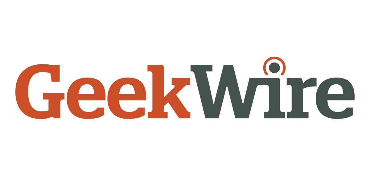 (Logo) This is the logo for GeekWire, featuring the word in a serif font, split into reddish-orange ("Geek") and dark gray ("Wire"), with a small orange signal icon above the 'i'. Text: GeekWire Colors: #d65239, #4a544f, #ffffff Note: The image is a stylized wordmark intended to represent a specific brand or company, fitting the definition of a logo.