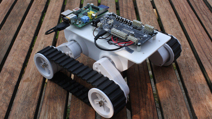 Laika-powered robot built using the Dagu Rover 5 robot chassis (about $70)