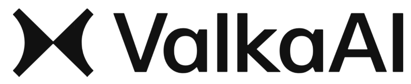 (Logo) A dark gray logo featuring a stylized 'X' symbol followed by the text 'ValkaaAI', all set against a solid black background. Text: ValkaaAI Colors: #262626, #000000 Note: The image clearly presents a distinct graphic symbol combined with a stylized brand name, designed for brand identification. This composition is characteristic of a logo.