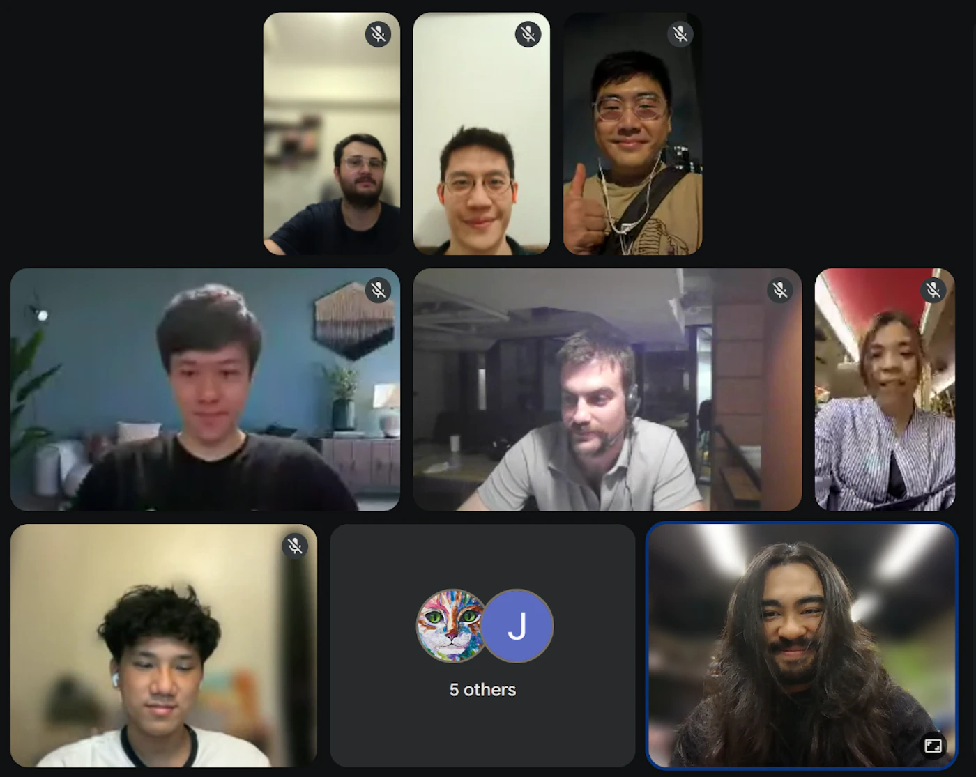 (Photo) A screenshot of a multi-participant video conference call showing seven individuals in separate video feeds and a tile indicating five additional participants. Text: 5 others people in a video conference | indoor | grid layout, mute icons, diverse participants, participant count indicator | candid | Colors: #121212, #f5f5f5, #3c4043 Note: The image is a composite of multiple real-life photographic video feeds of people, capturing a digital meeting environment.