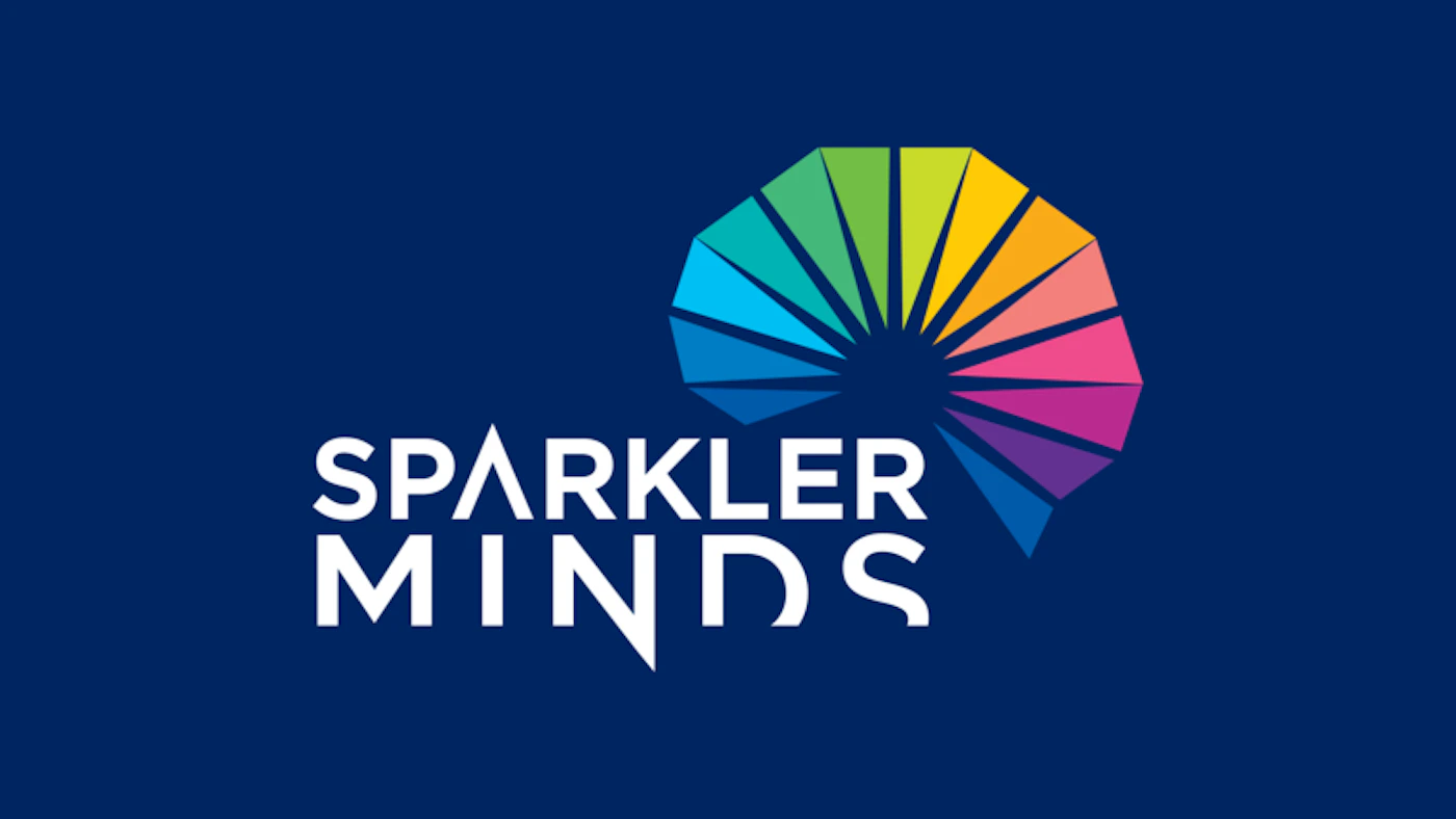 (Logo) A logo featuring the brand name 'SPARKLER MINDS' in white, stacked text, positioned next to a colorful graphic. The graphic is composed of multiple triangular segments arranged in a fan or brain-like shape, displaying a spectrum of colors from blue to green, yellow, orange, pink, and purple. The entire logo is set against a solid dark blue background. Text: SPARKLER MINDS Colors: #1A3370, #FFFFFF, #33A1DD, #33C7B3, #7ACC33, #FFCC33, #FF8C33, #FF338C, #A133DD, #3333DD Note: The image clearly presents a company name alongside a distinctive graphic element, designed to represent a brand or organization, which is characteristic of a logo.