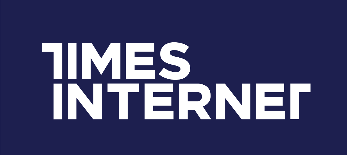 (Logo) A logo displaying the words "TIMES INTERNET" in bold, white, sans-serif capital letters, stacked on a solid dark blue background. Text: TIMES INTERNET Colors: #FFFFFF, #233060 Note: The image features a stylized representation of a brand name using distinct typography against a solid color background, which is characteristic of a corporate logo designed for immediate brand recognition.