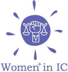 (Logo) A logo for 'Women+ in IC' featuring a purple circular emblem with a raised fist holding a balance scale, surrounded by sunburst rays, with a gender symbol on the wrist. Text: Women+ in IC Colors: #5c5cb4, #000000 Note: The image is a graphic representation of a brand or organization identity, combining a symbolic icon with the name 'Women+ in IC'.